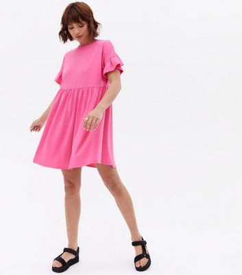 Click to view product details and reviews for Bright Pink Jersey Frill Mini Smock Dress New Look.