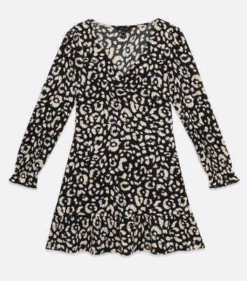 white and black leopard dress