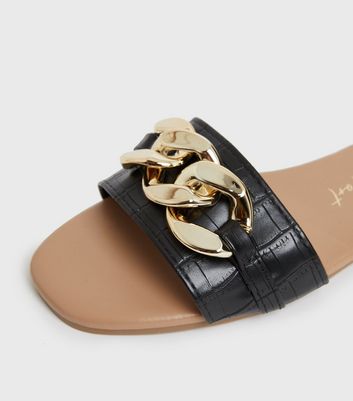 Click to view product details and reviews for Black Faux Croc Chain Sliders New Look Vegan.