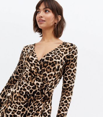 Click to view product details and reviews for Brown Leopard Print V Neck Mini Wrap Dress New Look.