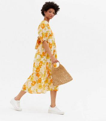 Click to view product details and reviews for Orange Retro Floral Tie Back Midi Dress New Look.