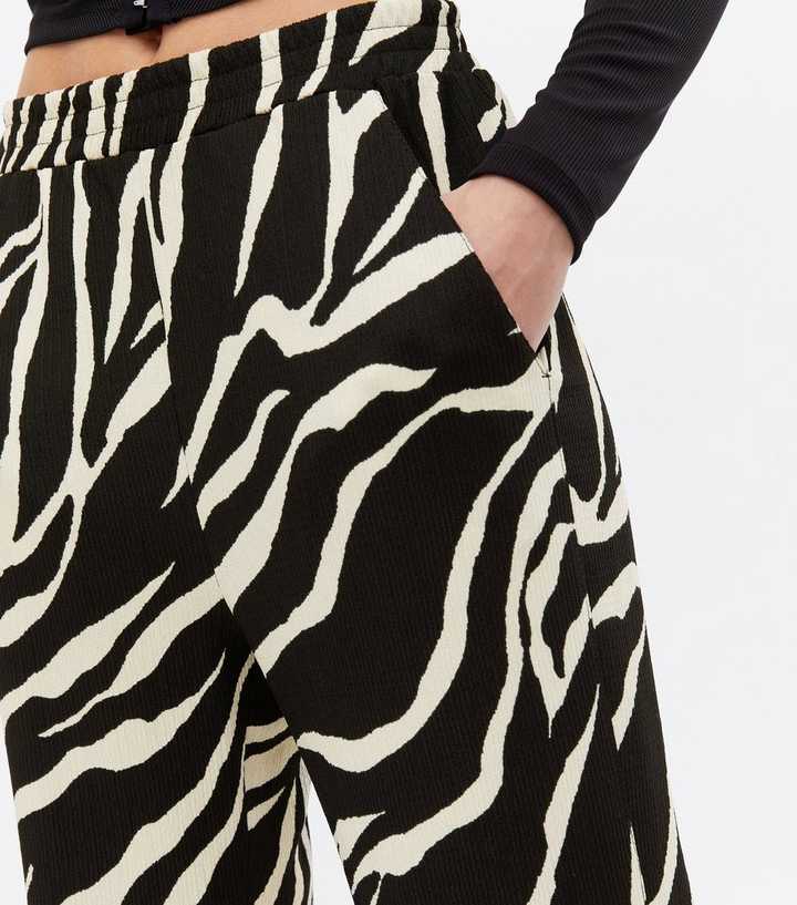 Black Zebra Print Flared Trousers