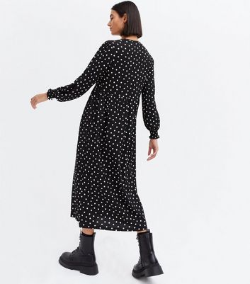 Click to view product details and reviews for Black Spot Long Sleeve Midi Dress New Look.