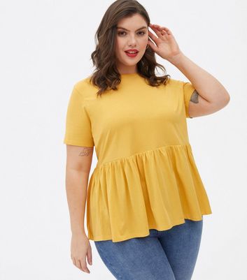 Click to view product details and reviews for Curves Mustard Short Sleeve Peplum T Shirt New Look.