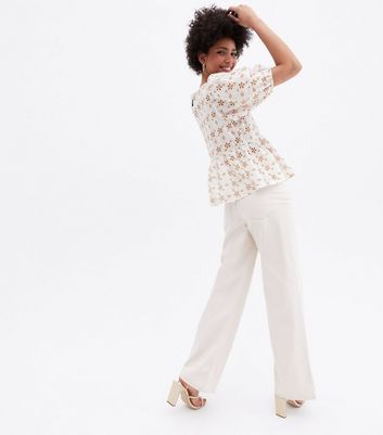 Click to view product details and reviews for Rust Floral Broderie Peplum Top New Look.
