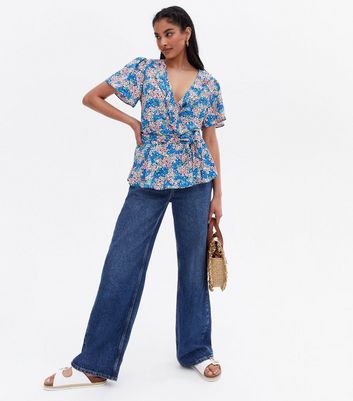 Click to view product details and reviews for Blue Daisy Peplum Wrap Blouse New Look.