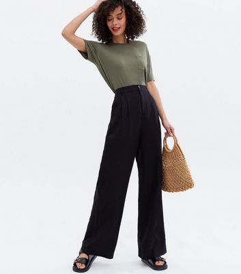 Wide linen-blend trousers - Black - Ladies | H&M MY
