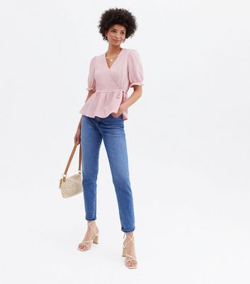 Click to view product details and reviews for Pale Pink Textured V Neck Peplum Wrap Blouse New Look.