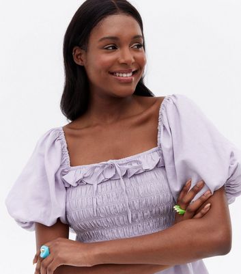 Off the shoulder store shirred peplum blouse