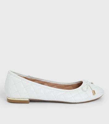 White flat ballet store pumps