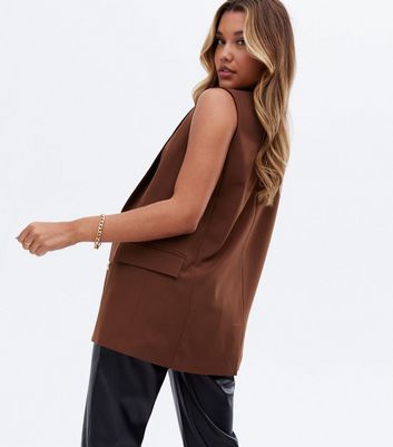 brown sleeveless blazer