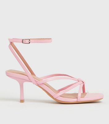 pink strappy shoes