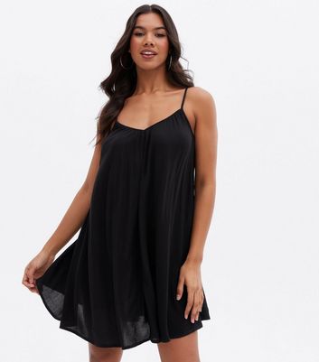 black v neck swing dress