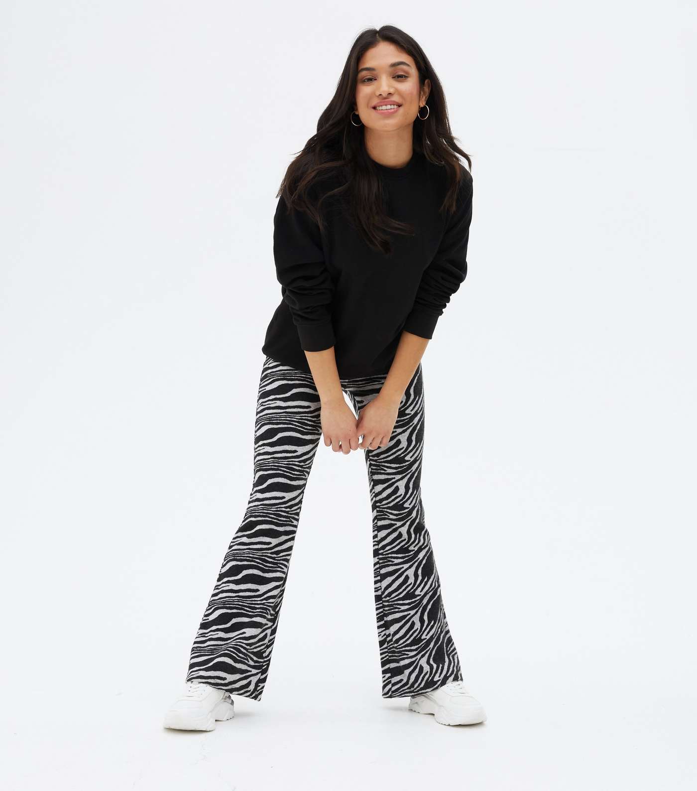Petite Black Zebra Print Jersey Flared Trousers