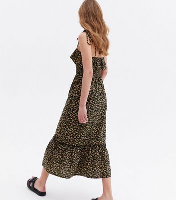 Click to view product details and reviews for Black Ditsy Floral Linen Look Shirred Midi Dress New Look.