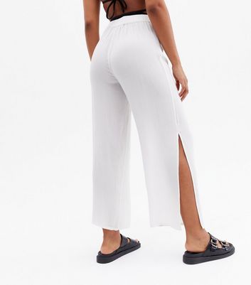 white crinkle trousers