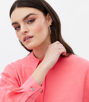 Click to view product details and reviews for Bright Pink Long Sleeve Oversized Shirt New Look.