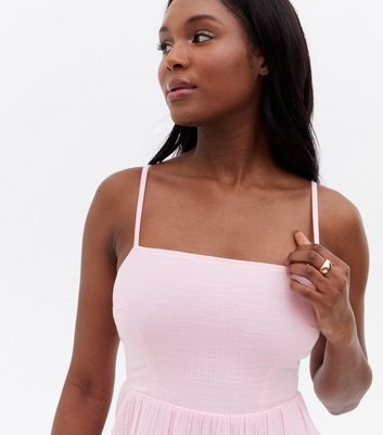 Click to view product details and reviews for Pink Strappy Square Neck Tiered Mini Dress New Look.