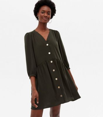 Click to view product details and reviews for Khaki Button Front Mini Smock Dress New Look.