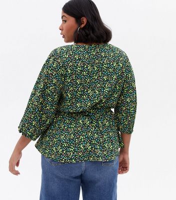 Click to view product details and reviews for Curves Black Ditsy Floral Crepe Wrap Blouse New Look.