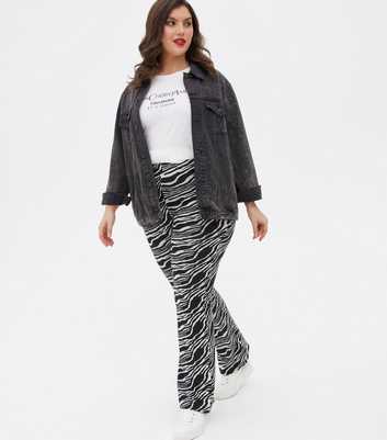 Curves Black Zebra Print Jersey Flared Trousers