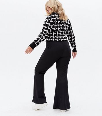 Click to view product details and reviews for Curves Black Ribbed Split Front Flared Trousers New Look.