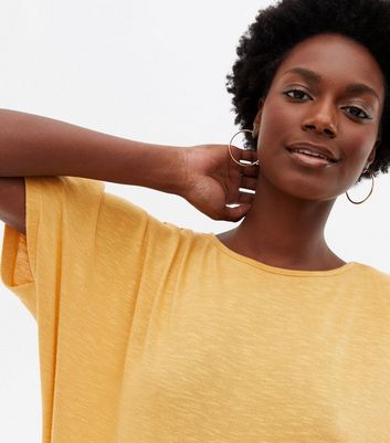 mustard batwing top