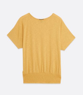mustard batwing top