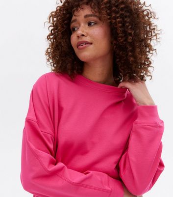 Pink oversized sweatshirt hotsell