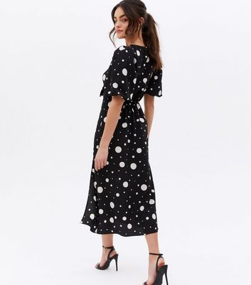 Click to view product details and reviews for Black Spot Tie Front Split Midi Dress New Look.