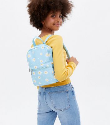 Little girl with outlet backpack