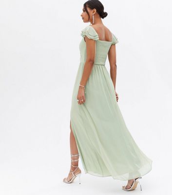 Click to view product details and reviews for Little Mistress Light Green Ruched Frill Maxi Dress New Look.