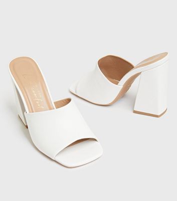 Click to view product details and reviews for Cool Flair White Flared Heel Mules New Look Vegan.