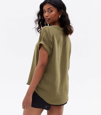 Click to view product details and reviews for Khaki Short Sleeve Overhead Shirt New Look.