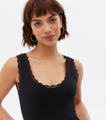https://media2.newlookassets.com/i/newlook/820509601/womens/clothing/tops/black-lace-trim-ribbed-vest.jpg