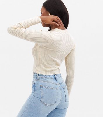 Click to view product details and reviews for Cream Ribbed Crew Neck Crop Jumper New Look.