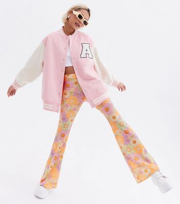Click to view product details and reviews for Sunflower Power Petite Orange Floral Flared Trousers New Look.