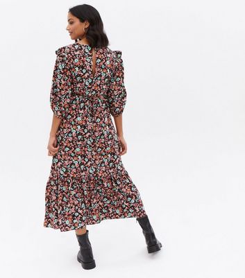 Click to view product details and reviews for Maternity Black Floral Tiered Puff Sleeve Midi Dress New Look.