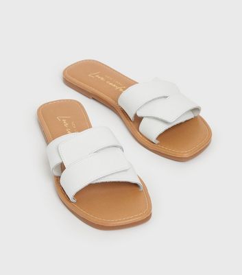 white cross over sandals