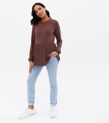 Click to view product details and reviews for Maternity Dark Brown Ribbed Peplum Long Sleeve Top New Look.