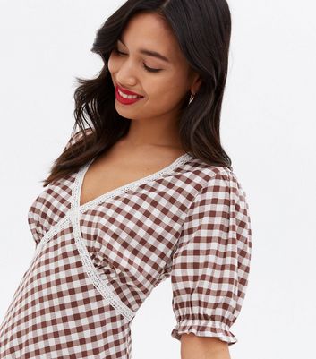 Click to view product details and reviews for Brown Gingham Lace Trim V Neck Midi Dress New Look.