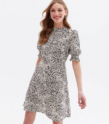 Click to view product details and reviews for Off White Leopard Print Frill High Neck Mini Dress New Look.