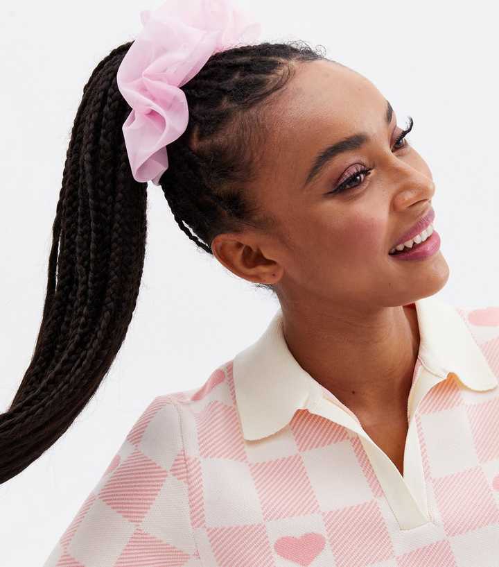 Image of Ponytail with pink scrunchie hairstyle