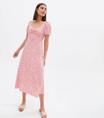 Click to view product details and reviews for Pink Floral Ruched Sweetheart Midi Dress New Look.