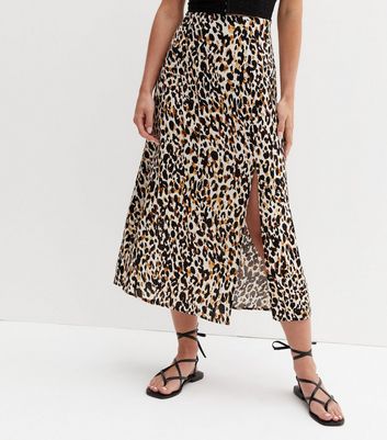 Mid length outlet leopard skirts reddit