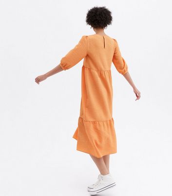 Click to view product details and reviews for Orange Crinkle 3 4 Sleeve Tiered Midi Smock Dress New Look. Click to view product details and reviews for Orange Crinkle 3 4 Sleeve Tiered Midi Smock Dress New Look.
