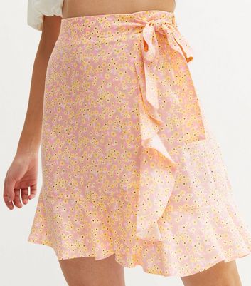 Click to view product details and reviews for Pink Ditsy Floral Frill Mini Wrap Skirt New Look.