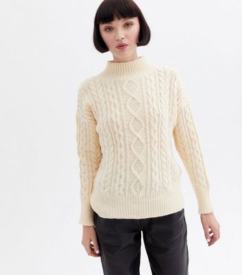 white cable sweater