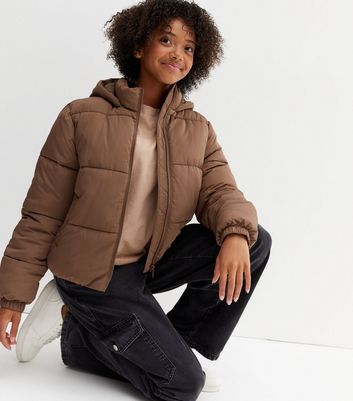 Girl in store puffer jacket