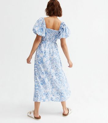 Click to view product details and reviews for Blue Floral Shirred Puff Sleeve Midi Dress New Look.